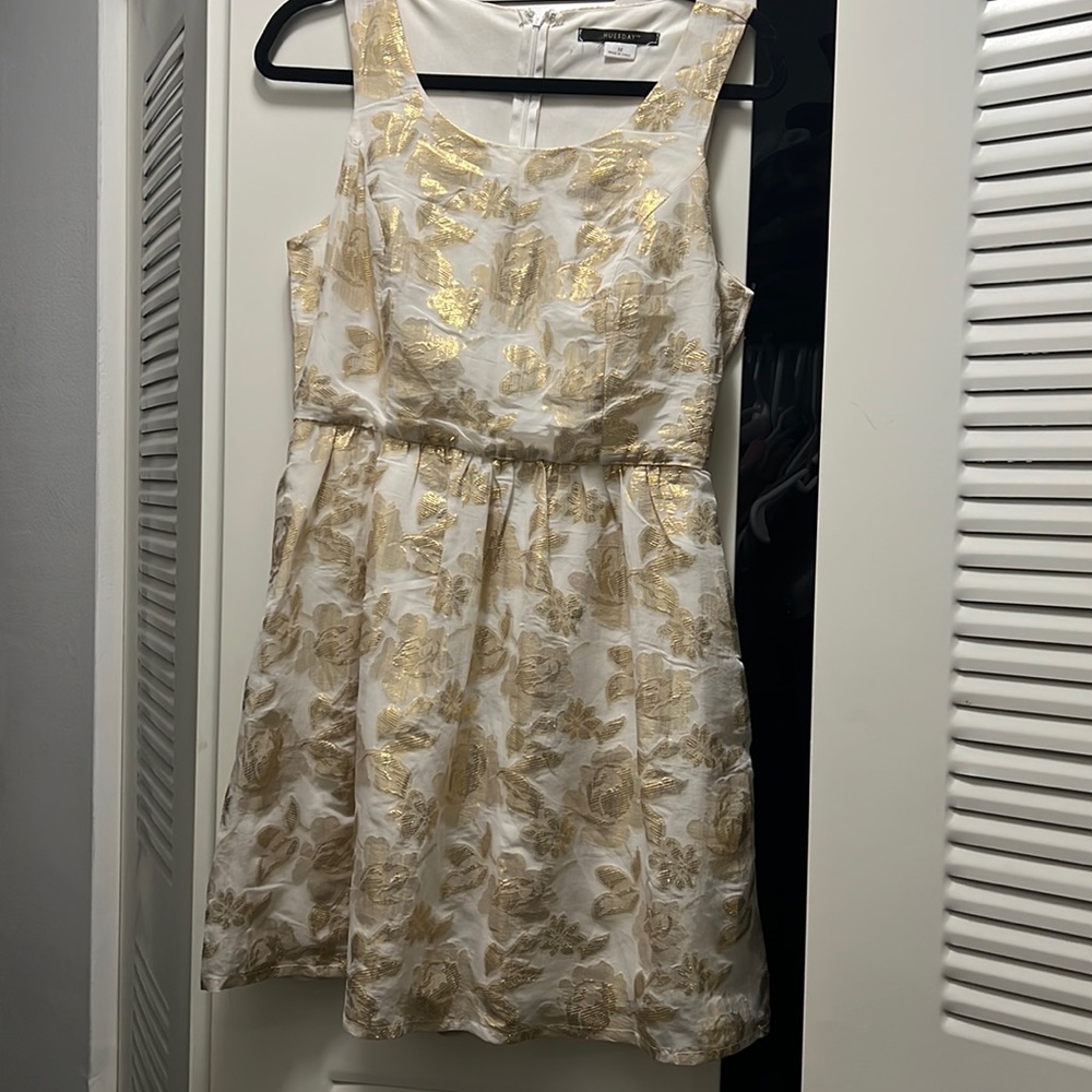 A gold flowerless dress
